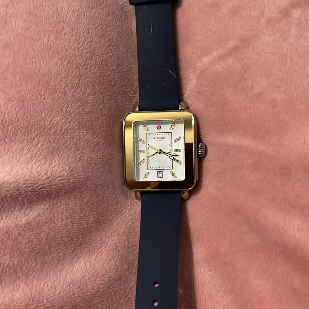 Michelle watch.   Navy silicon strap.